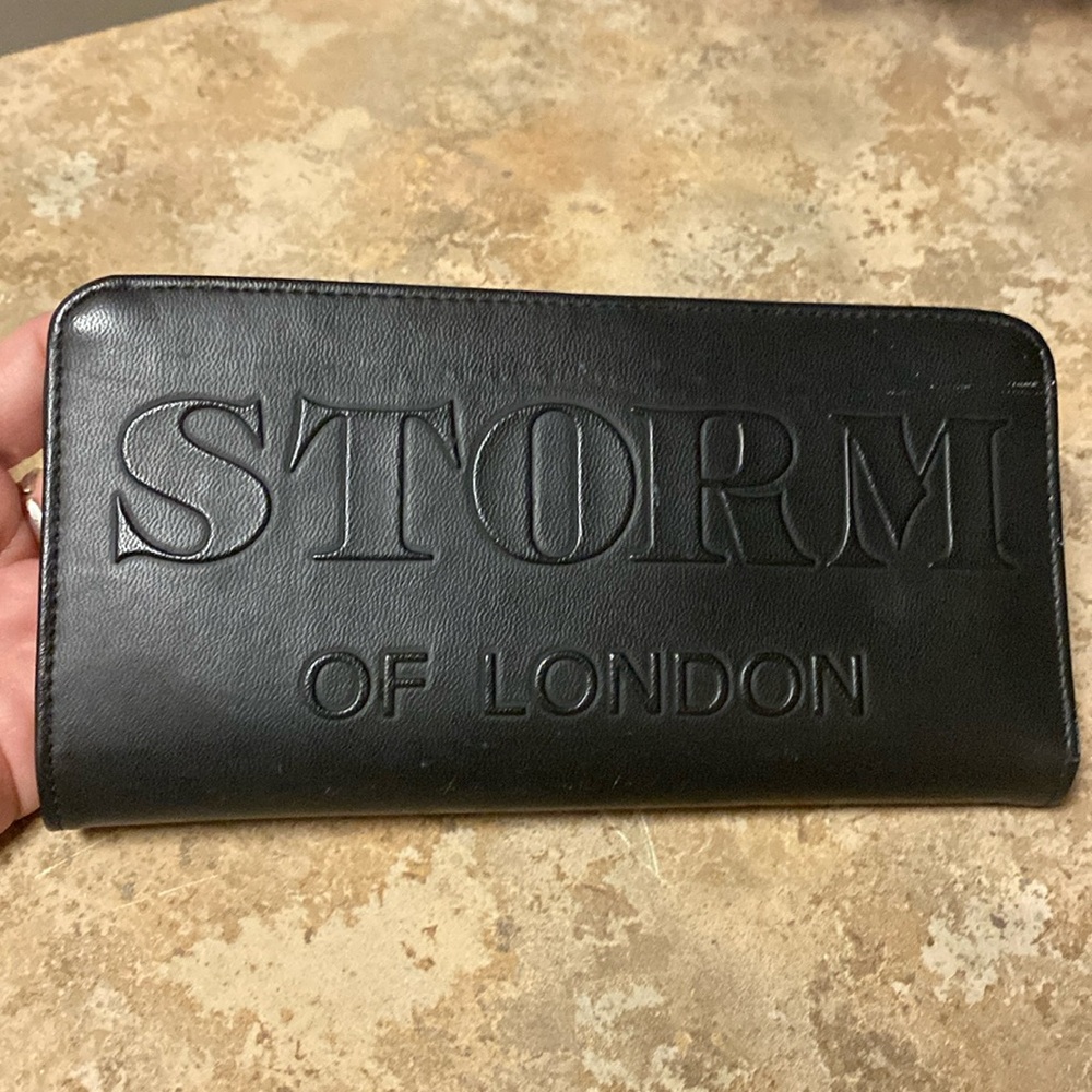 STORM LONDON LONG WALLET IN BLACK IT HAS 3 COMPARTMENTS 8 CARD HOLDERS